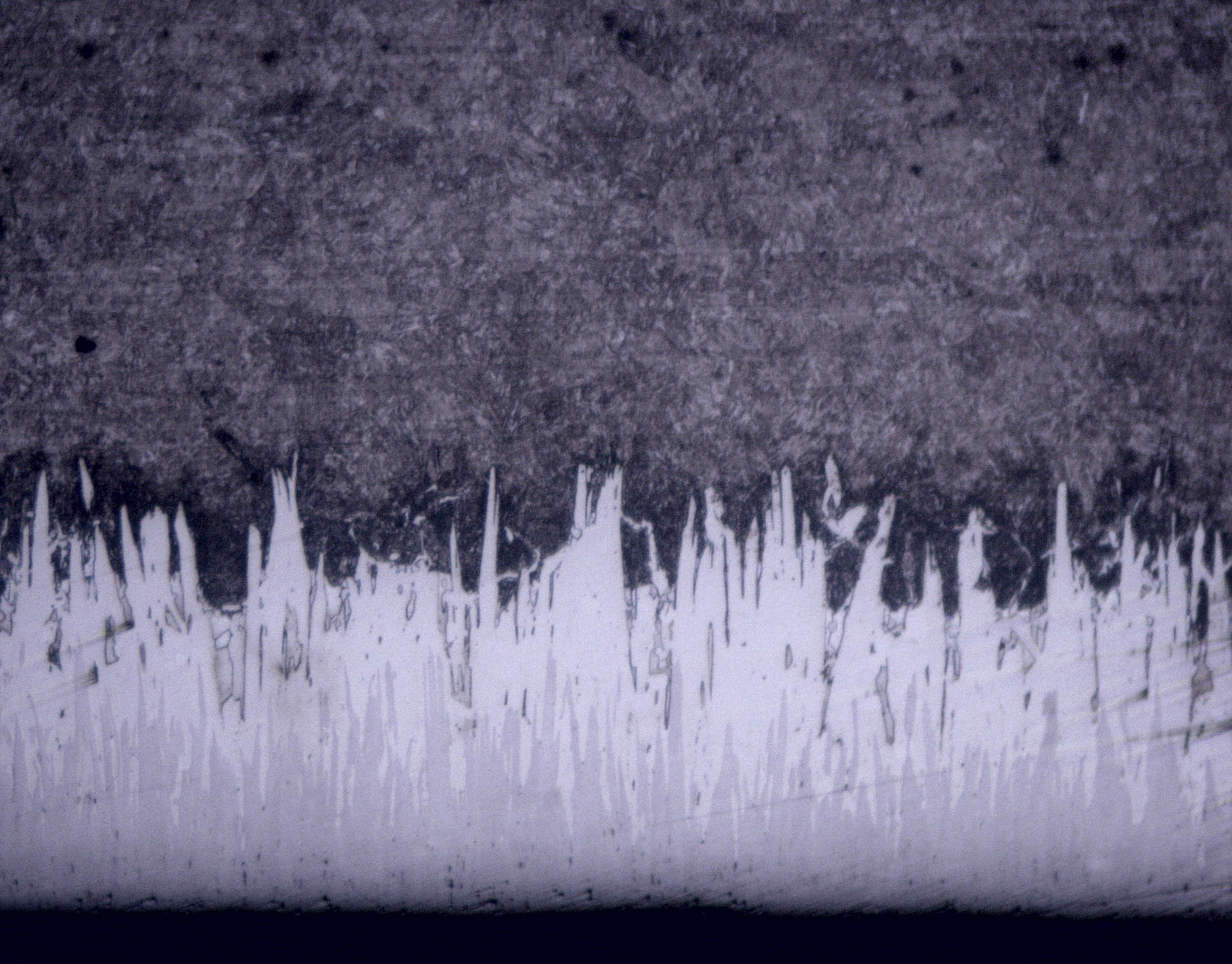 SEM cross-section of Fusion X treatment on AISI 4130 grade